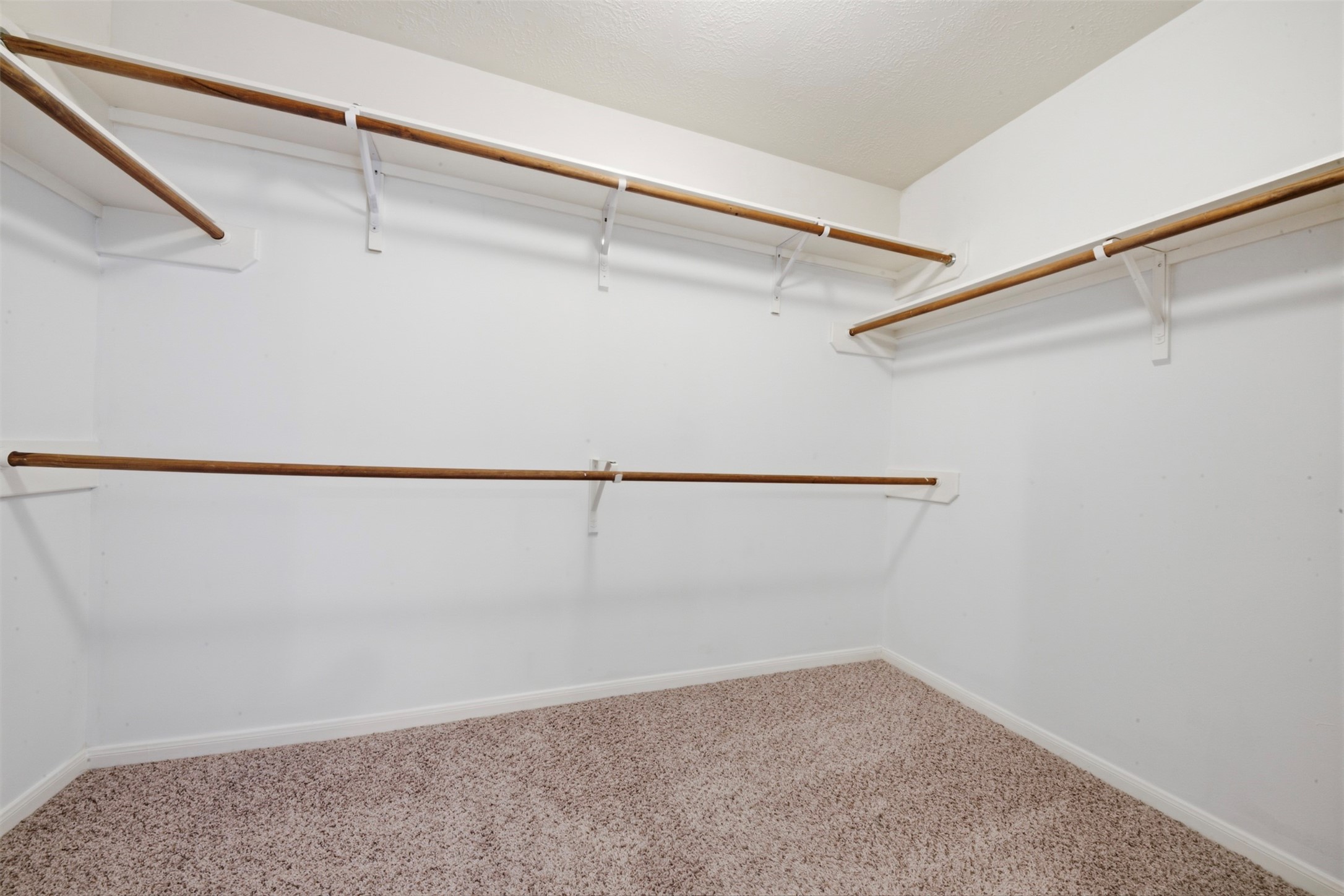 2446 Halstead Drive Spring, TX 77386 - Photo 27 of 45 Spacious walk in closet in the primary bathroom.