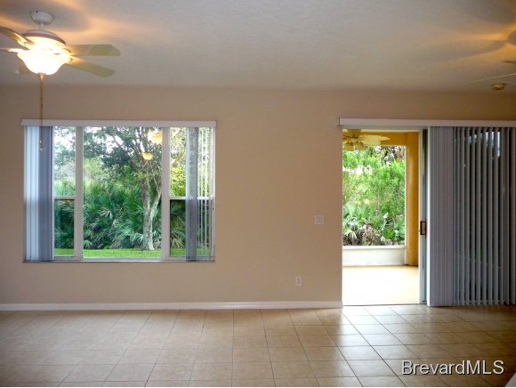 8225 Simpkins Way Melbourne, FL 32940 - Photo 5 of 12 a view of a room with a large window