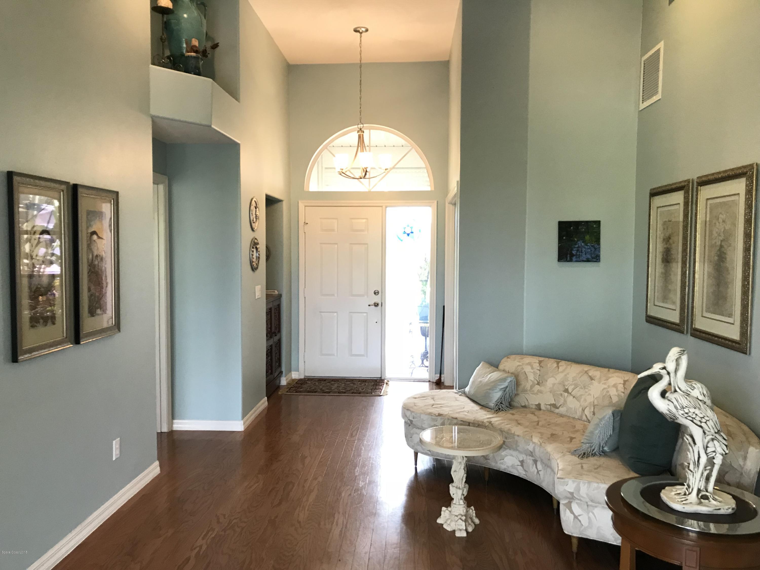 1041 Sunswept Road Northeast Palm Bay, FL 32905 - Photo 14 of 46 Living Room