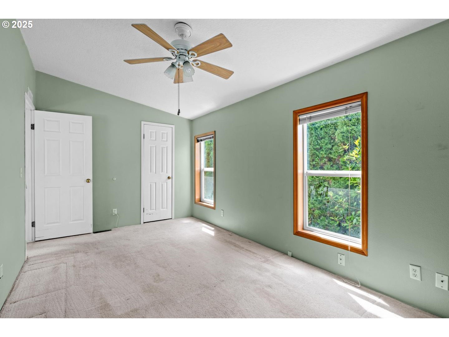 17629 Northwest Shady Fir Loop Beaverton, OR 97006 - Photo 14 of 27 a view of an empty room with a window