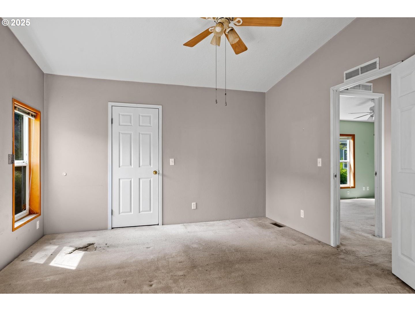 17629 Northwest Shady Fir Loop Beaverton, OR 97006 - Photo 16 of 27 a view of an empty room with closet and a window