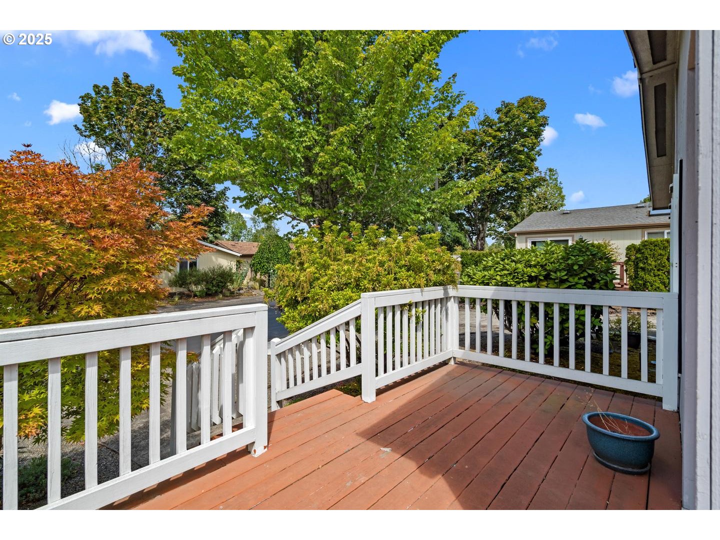 17629 Northwest Shady Fir Loop Beaverton, OR 97006 - Photo 22 of 27 a view of balcony with wooden floor
