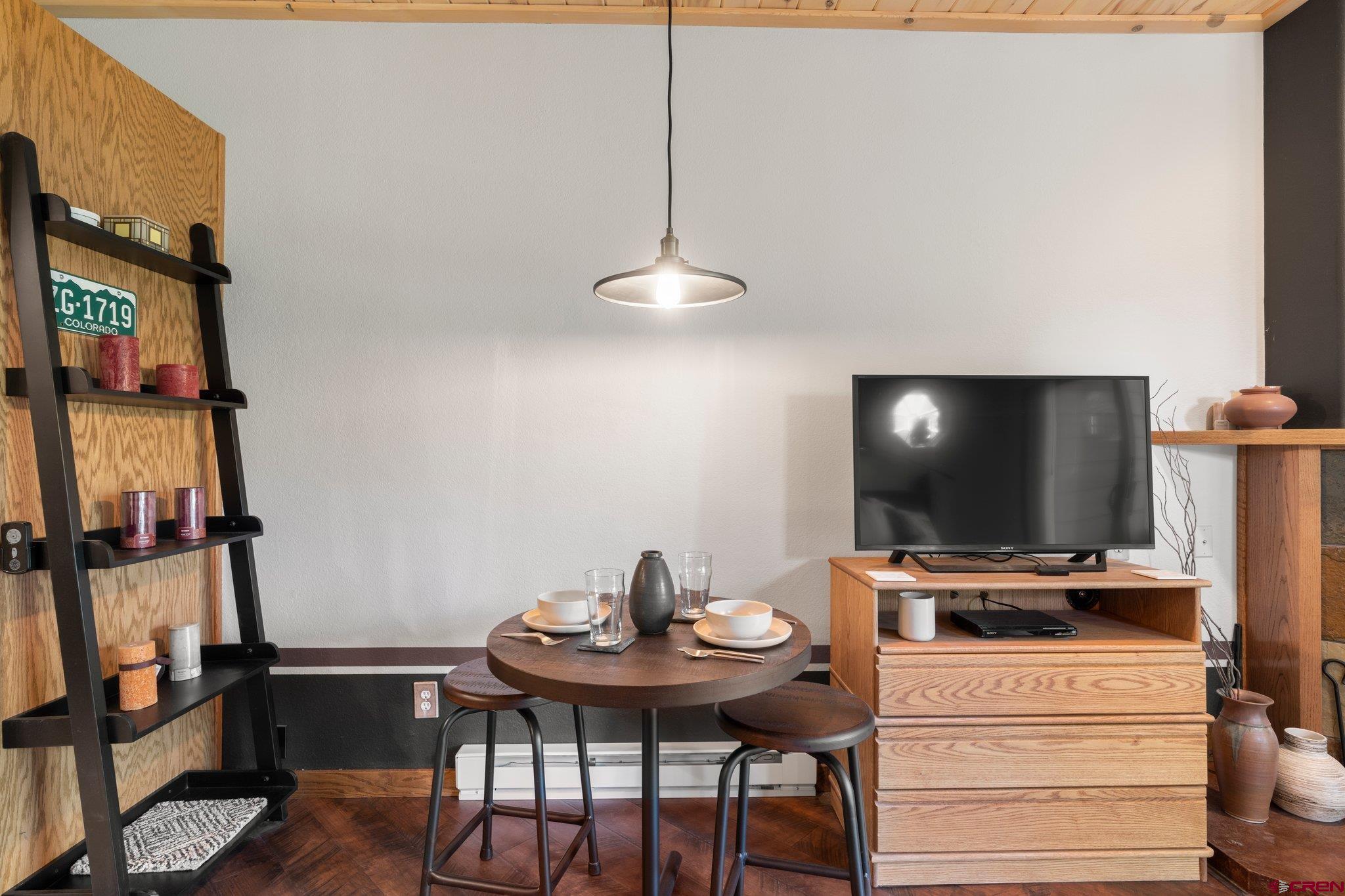 50827 Highway 550, Unit 339 Durango, CO 81301 - Photo 13 of 28 a living room with furniture and a flat screen tv
