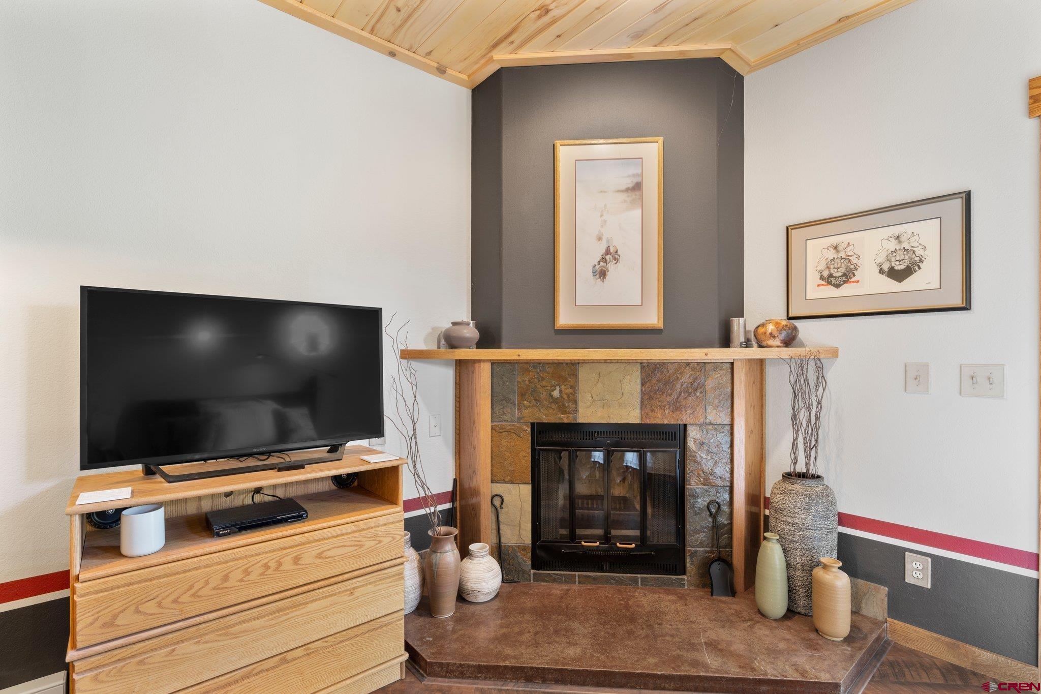 50827 Highway 550, Unit 339 Durango, CO 81301 - Photo 15 of 28 a living room with furniture and a flat screen tv