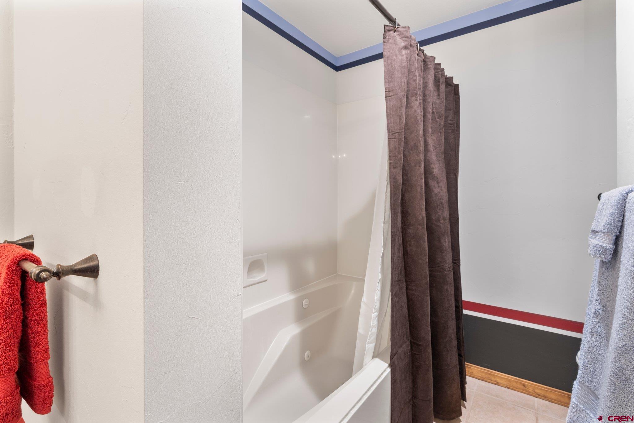 50827 Highway 550, Unit 339 Durango, CO 81301 - Photo 17 of 28 a bathroom with a shower