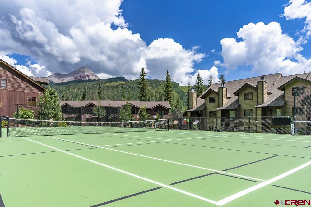 50827 Highway 550, Unit 339 Durango, CO 81301 - Photo 25 of 28 a view of a tennis ground with large trees