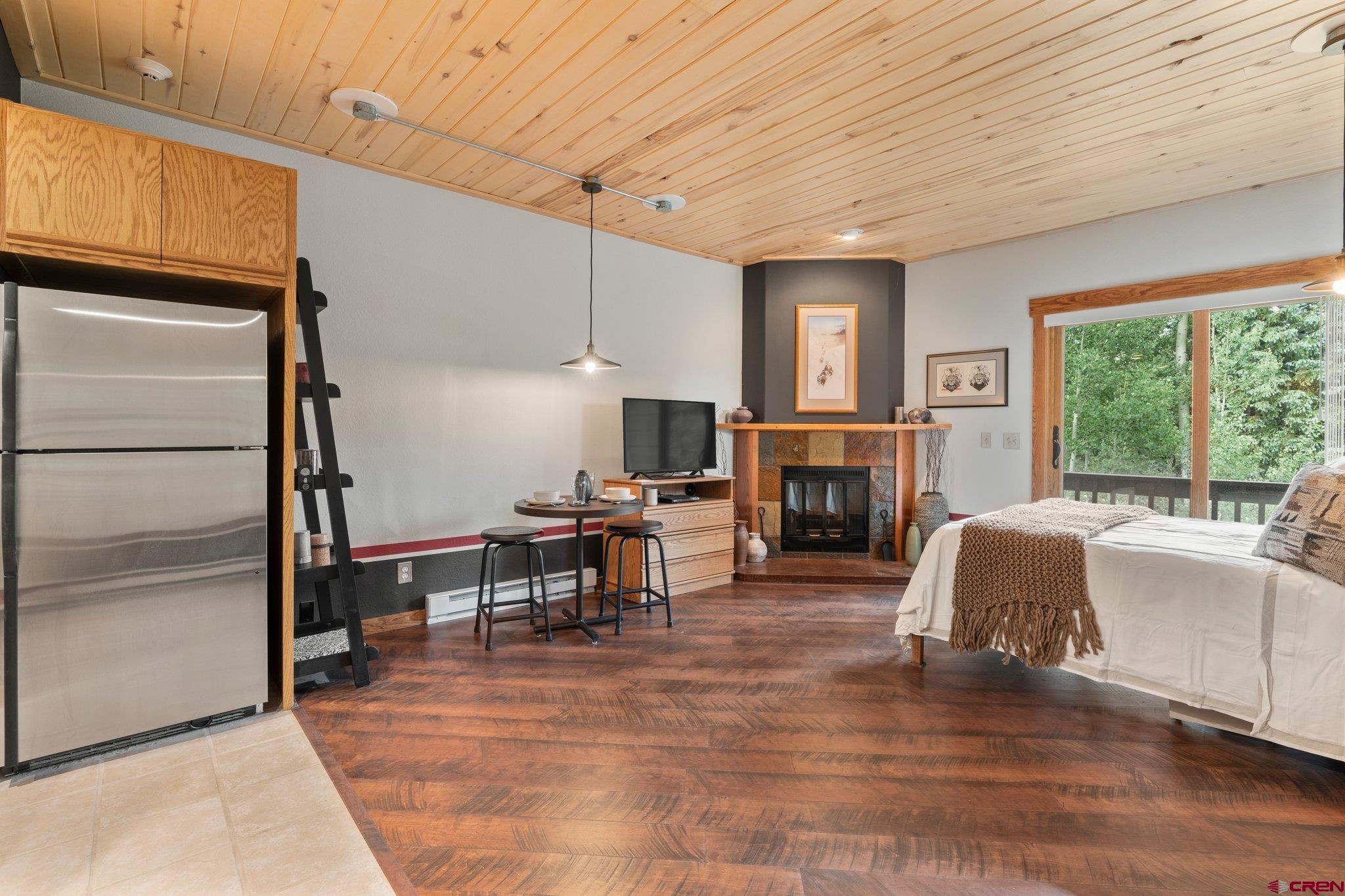 50827 Highway 550, Unit 339 Durango, CO 81301 - Photo 4 of 28 a living room with furniture and a fireplace
