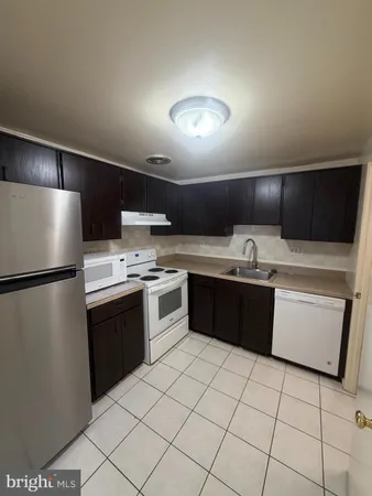 a view of hallway with sink