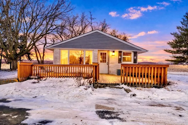a view of a brick house with a large outdoor space