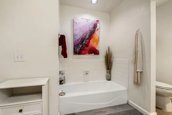 a bathroom with a sink and a tub