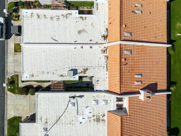 a view of a balcony with table and chairs