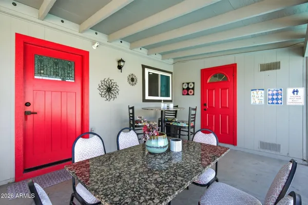 a view of a dining room with furniture