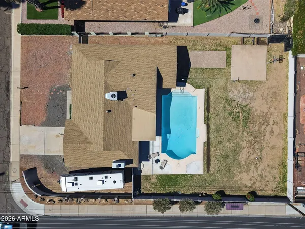 front view of a house with a fountain