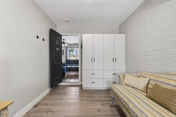 a view of bathroom with bathtub and wooden floor
