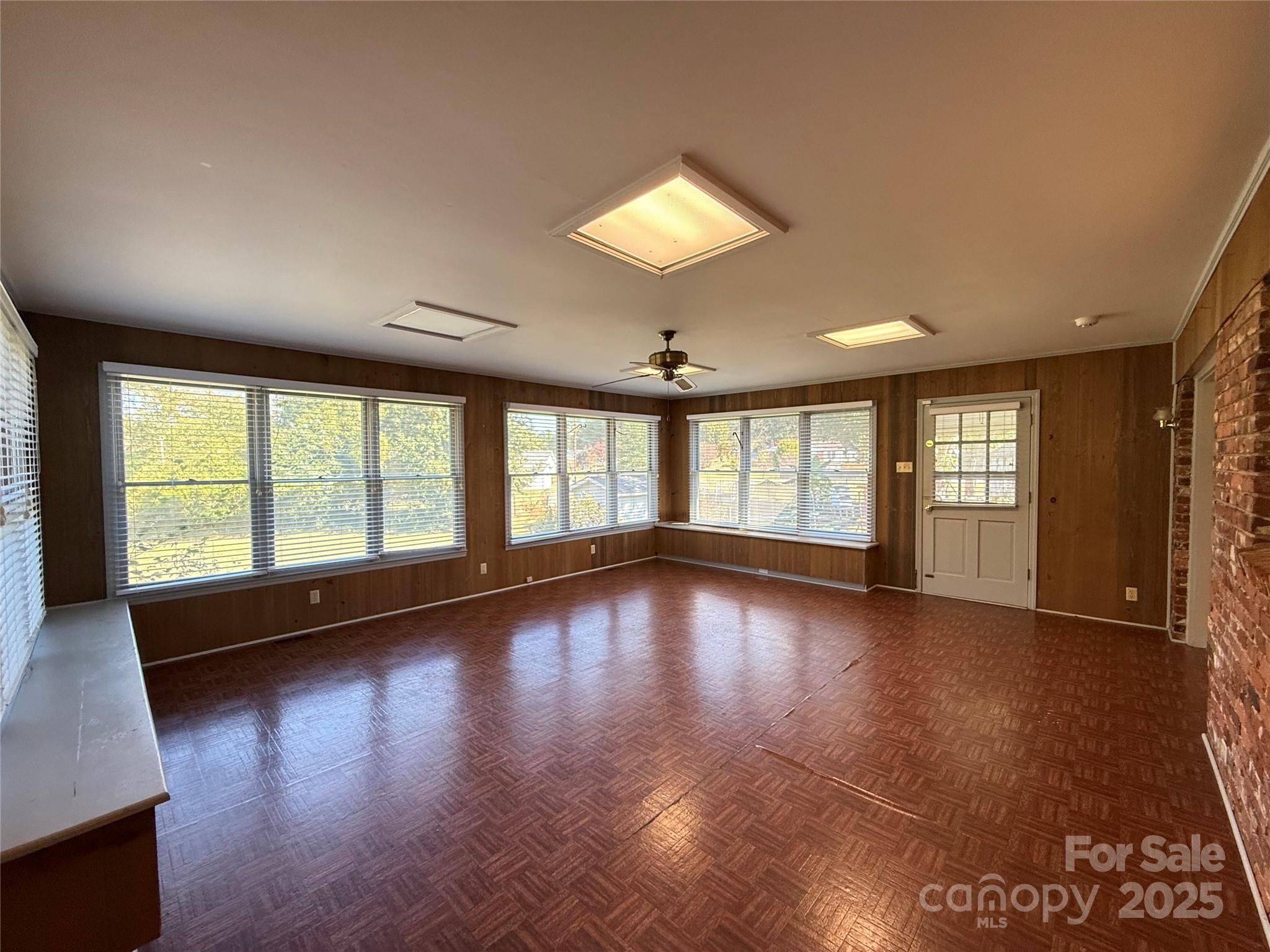 115 Chester Avenue Great Falls, SC 29055 - Photo 11 of 32 a view of empty room with wooden floor and fan