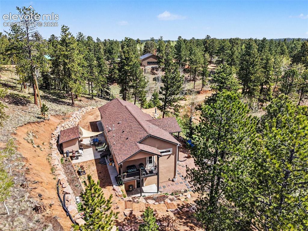 45 Valley Circle Divide, CO 80814 - Photo 35 of 42 an aerial view of a house with a yard