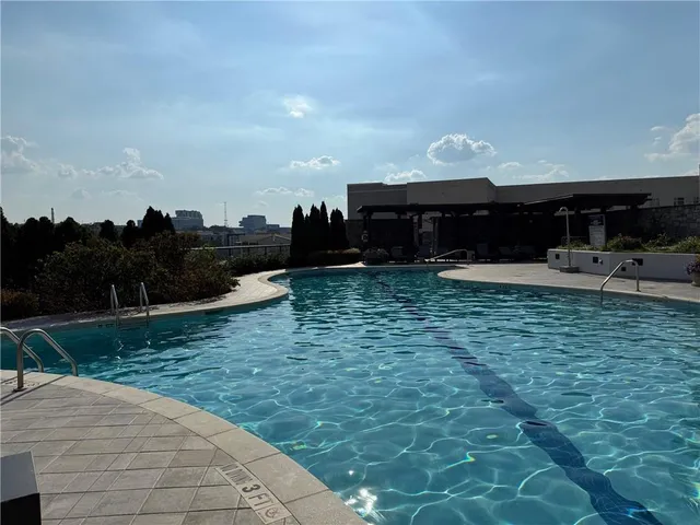 a view of a chairs and table in a patio