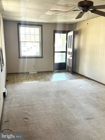 an empty room with windows