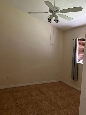 a bathroom with a sink vanity and a mirror