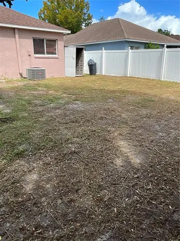 a view of backyard of house