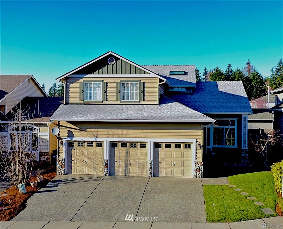 3315 189th Place Southeast Bothell, WA 98012 - Photo 1 of 28 a front view of a house with yard