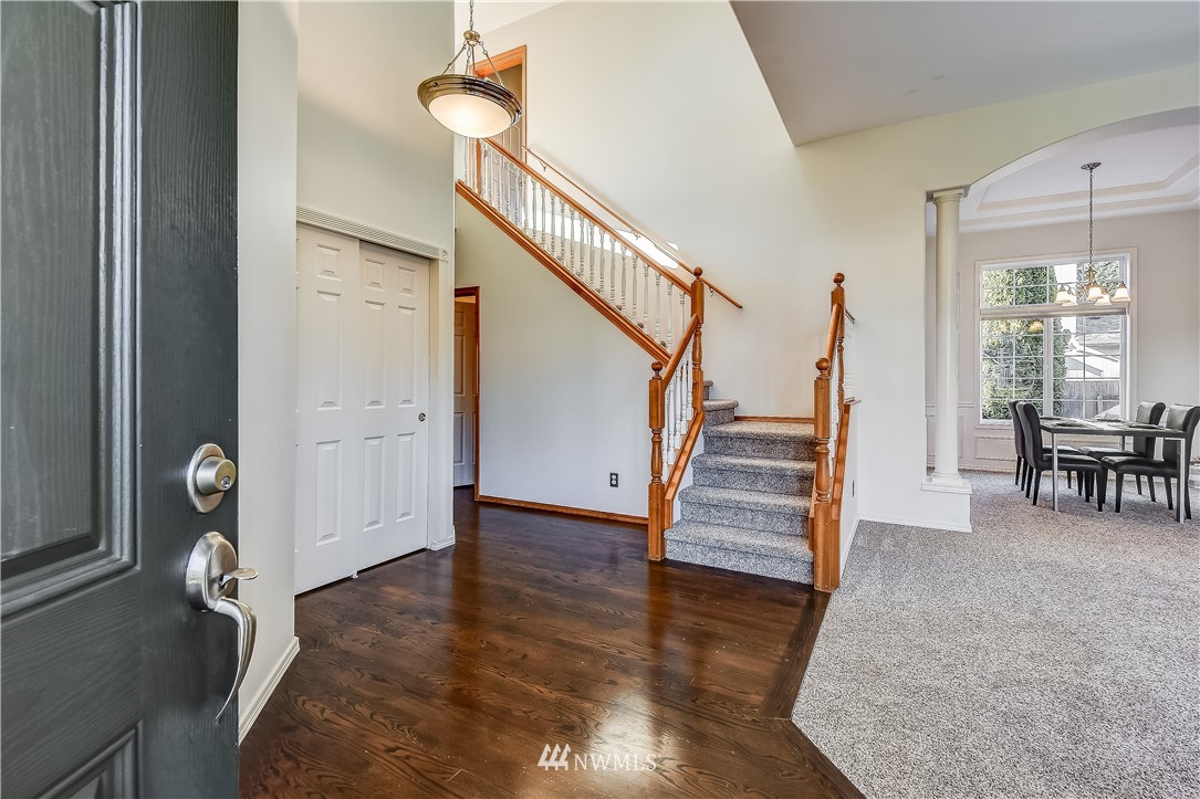 3315 189th Place Southeast Bothell, WA 98012 - Photo 2 of 28 a view of entryway and hall with wooden floor