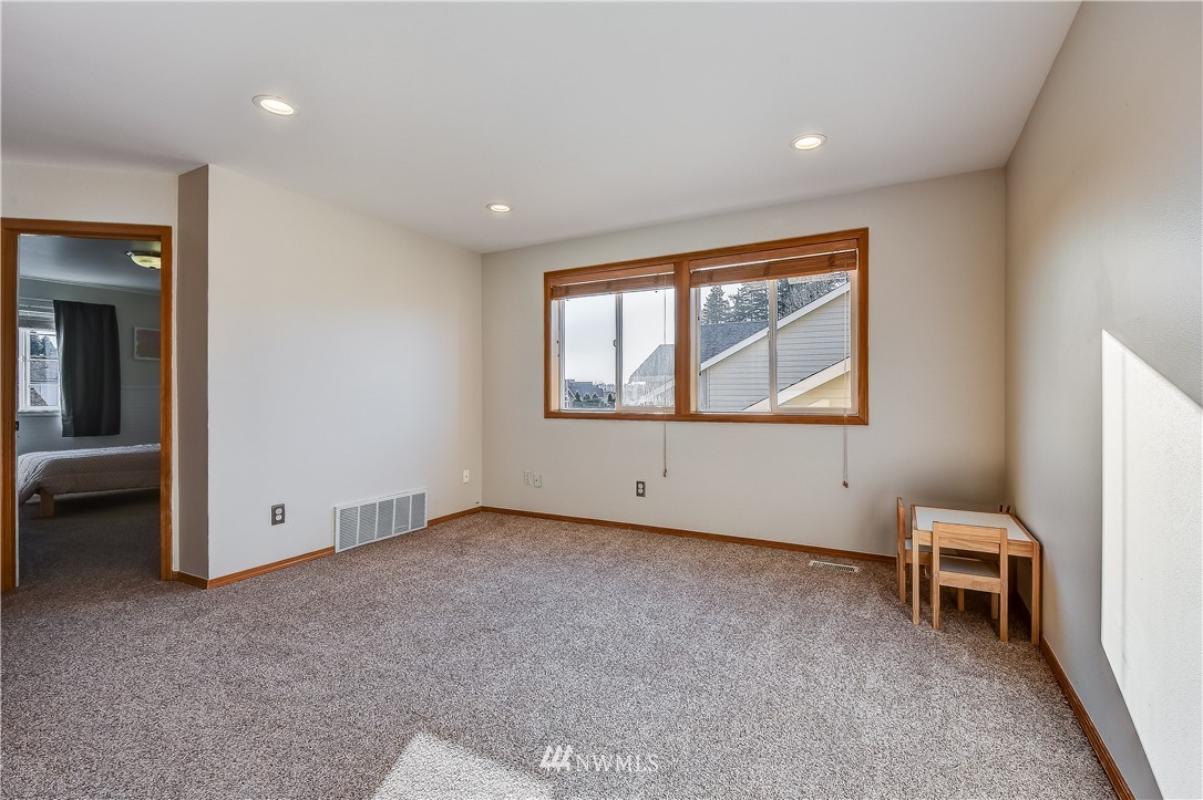 3315 189th Place Southeast Bothell, WA 98012 - Photo 20 of 28 a view of an empty room with a window