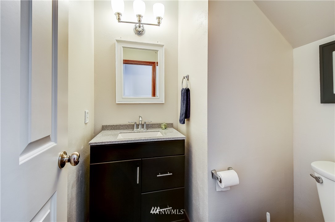 3315 189th Place Southeast Bothell, WA 98012 - Photo 22 of 28 a bathroom with a sink and a mirror