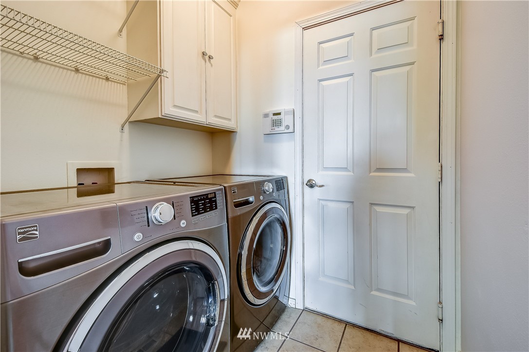 3315 189th Place Southeast Bothell, WA 98012 - Photo 23 of 28 a utility room with dryer and washer