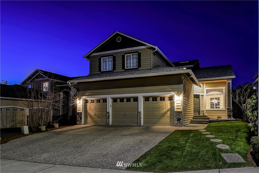 3315 189th Place Southeast Bothell, WA 98012 - Photo 27 of 28 a front view of a house with a yard