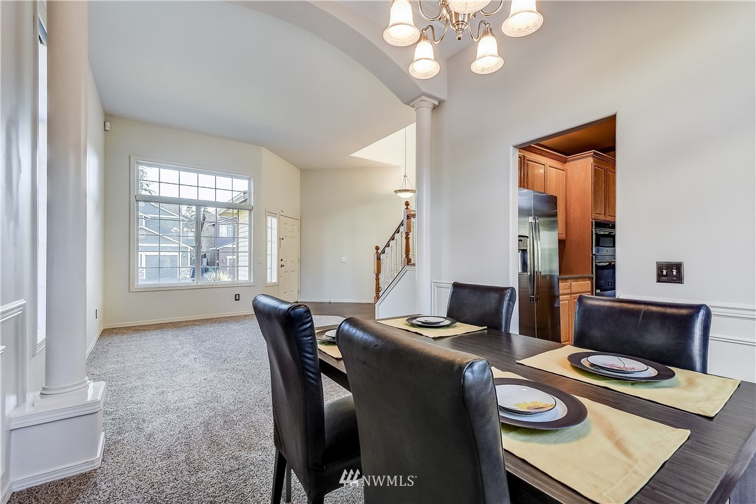 3315 189th Place Southeast Bothell, WA 98012 - Photo 8 of 28 a dining room with furniture and window