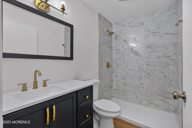 a sign that is sitting in front of flowers