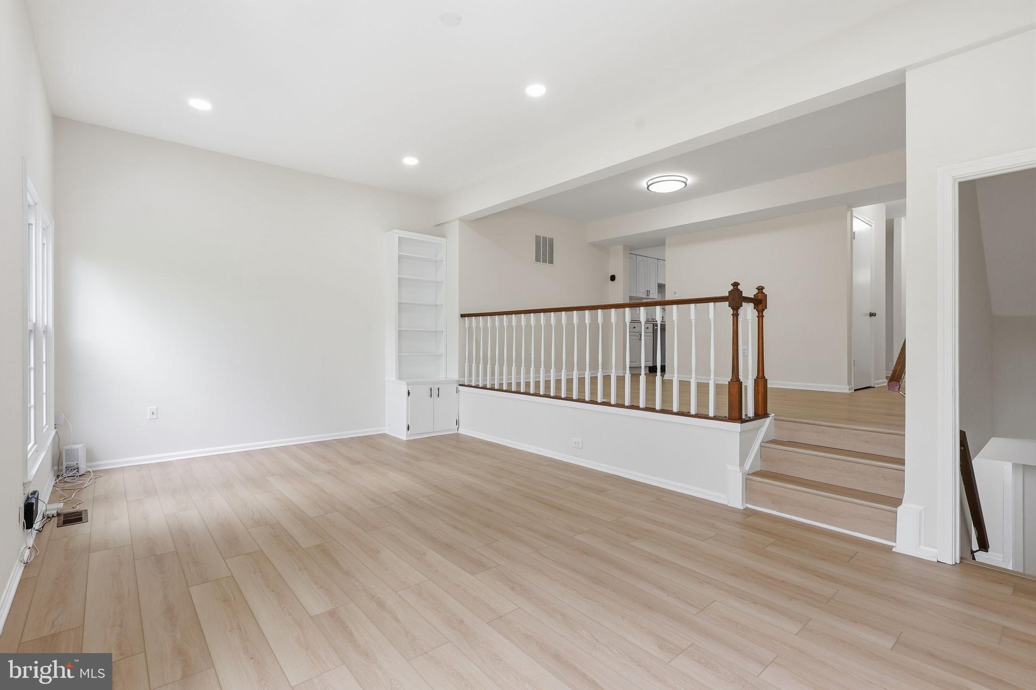 2151 Greenkeepers Court Reston, VA 20191 - Photo 13 of 44 Another angle of the family room and dining room