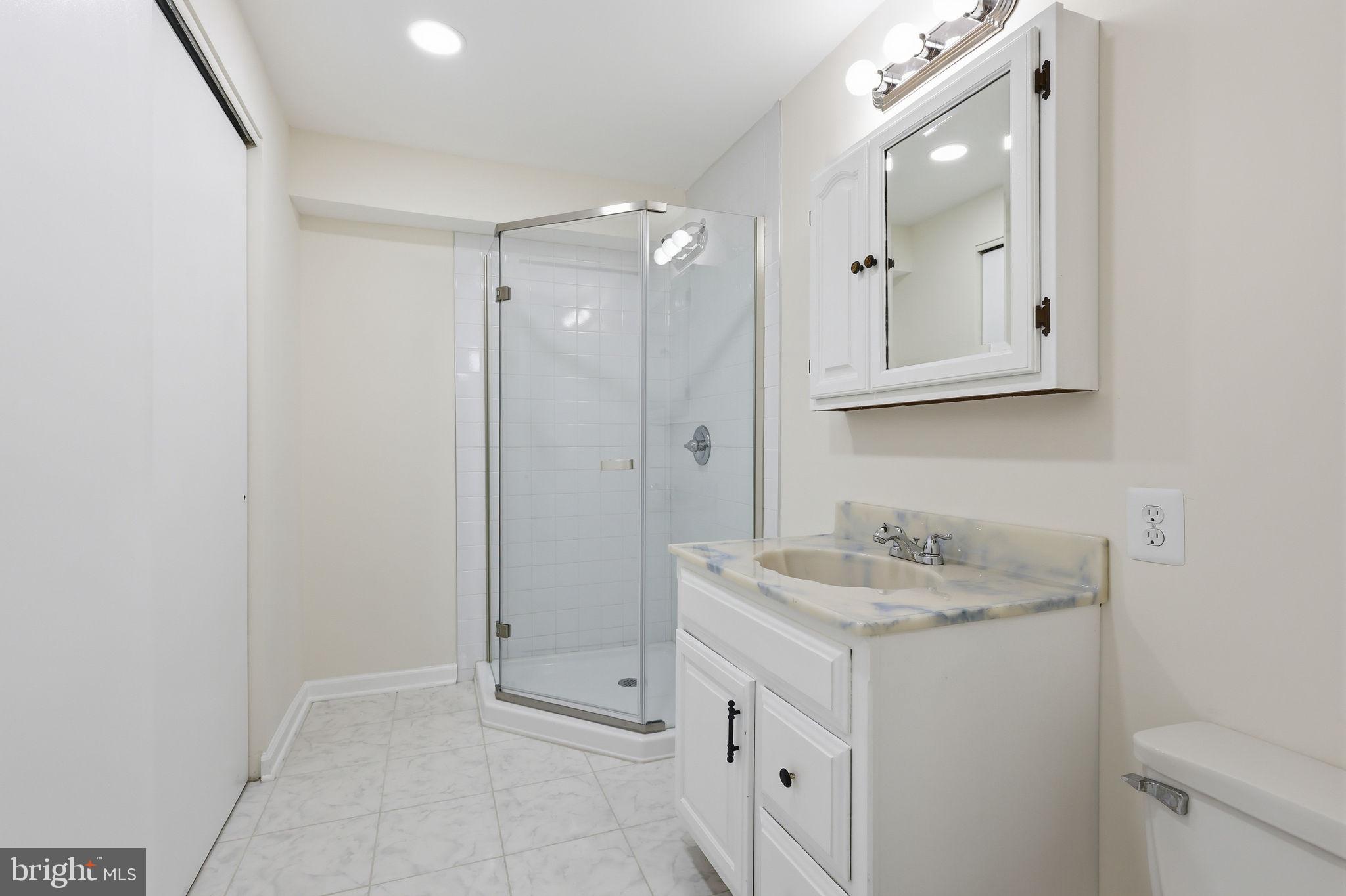 2151 Greenkeepers Court Reston, VA 20191 - Photo 29 of 44 Full bathroom on the lower level, great for guests