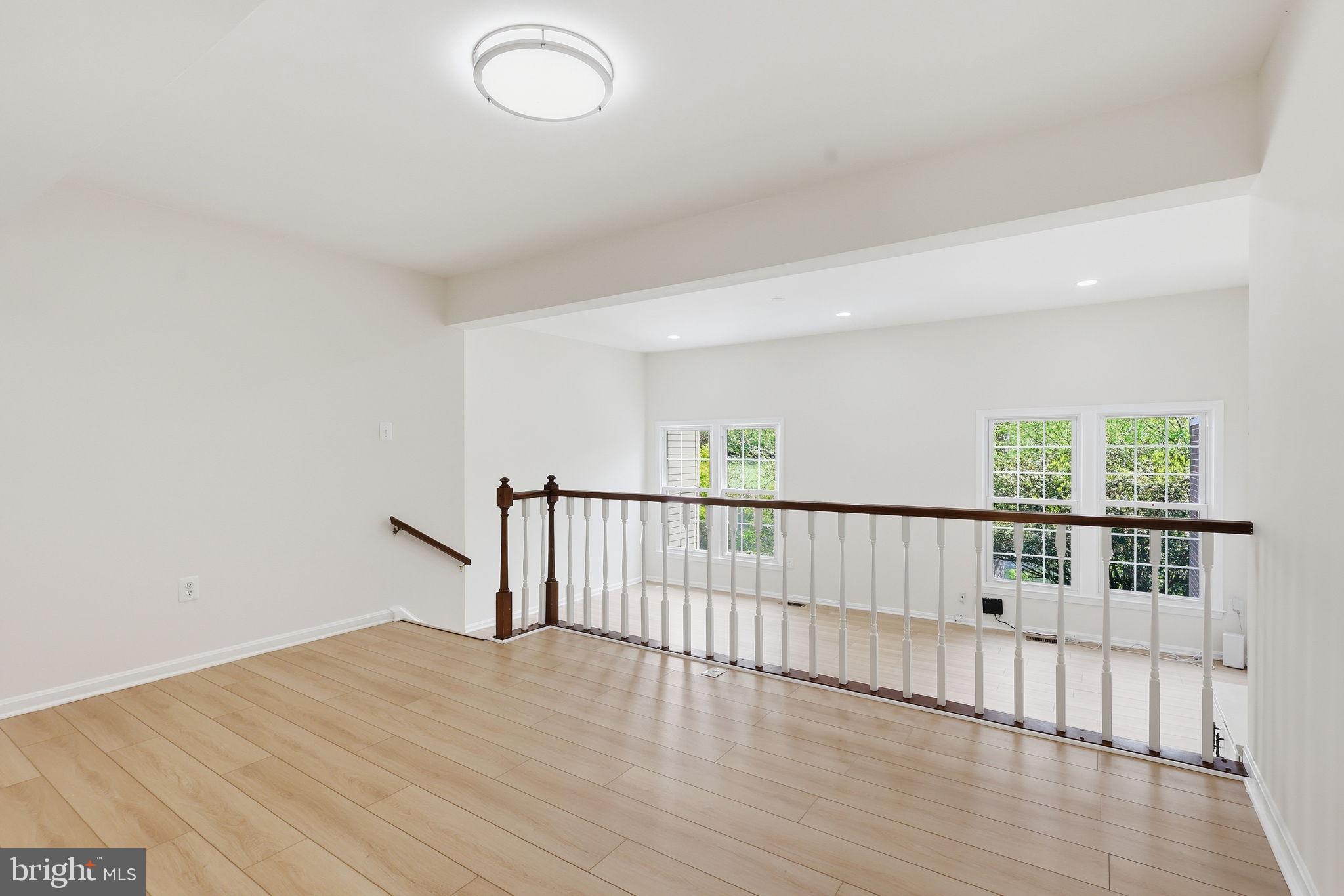 2151 Greenkeepers Court Reston, VA 20191 - Photo 10 of 44 Another view of the family room from dining room