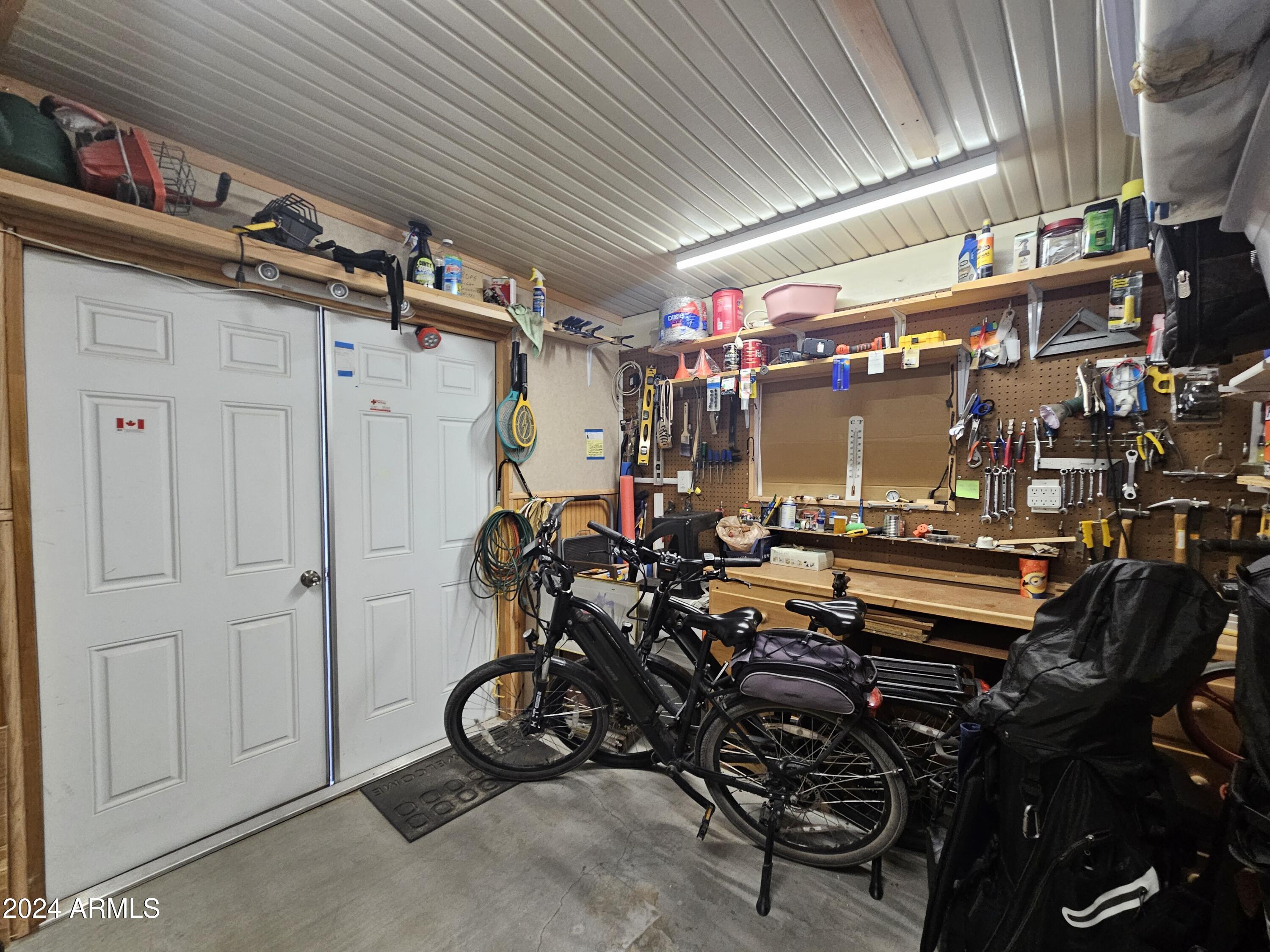 650 North Hawes Road, Unit 4412 Mesa, AZ 85207 - Photo 28 of 48 a view of a storage room with racks