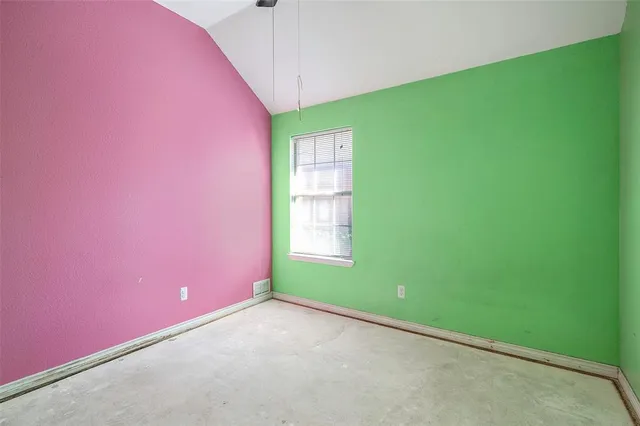 a view of a room with windows