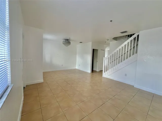 a view of an entryway with stairs