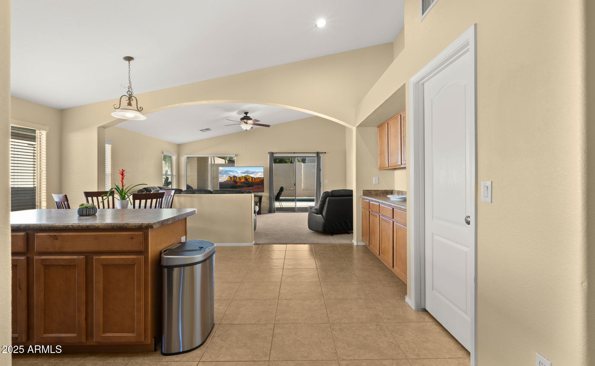 2215 West Peak View Road Phoenix, AZ 85085 - Photo 11 of 51 a lobby with furniture and a kitchen