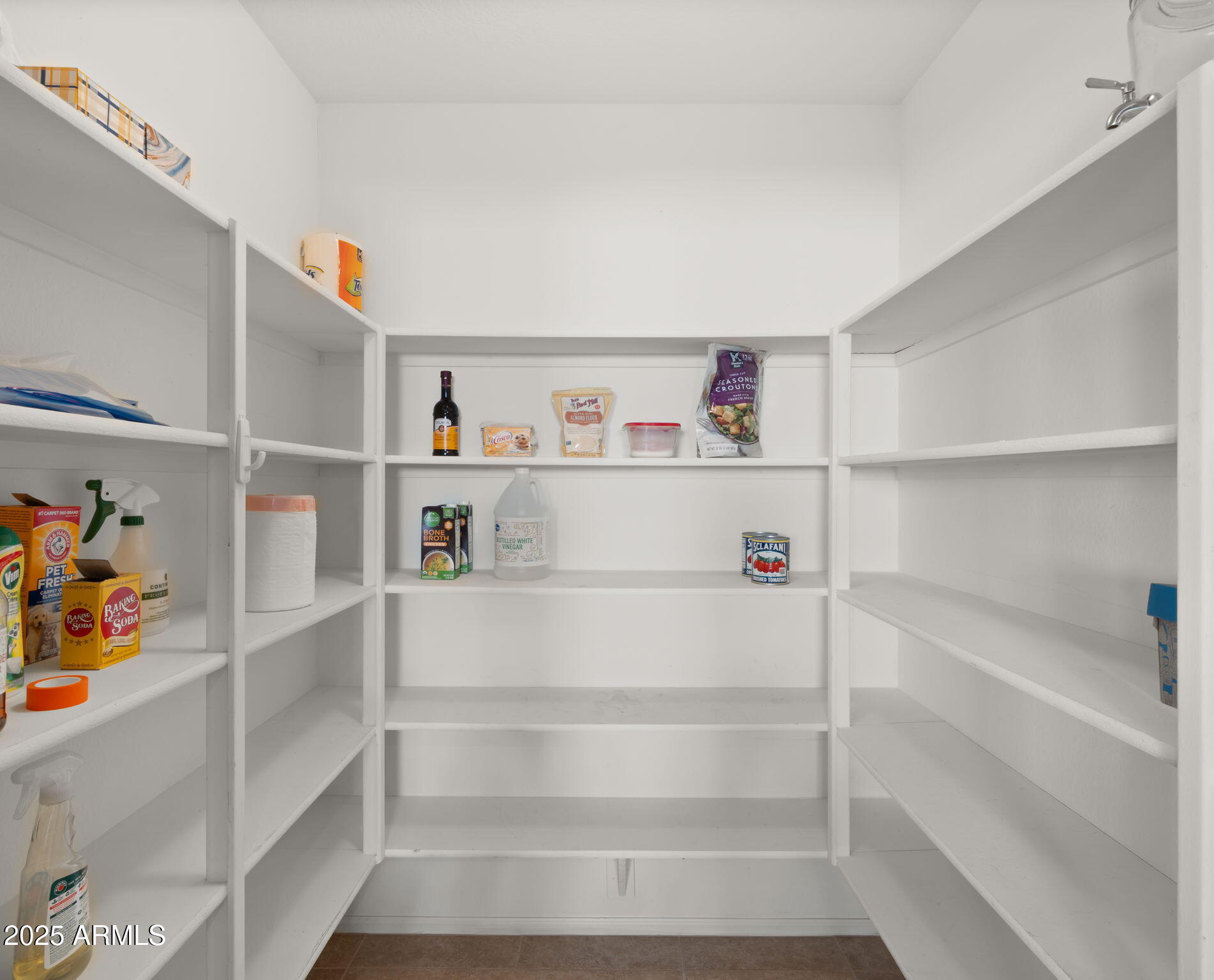 2215 West Peak View Road Phoenix, AZ 85085 - Photo 19 of 51 a view of an empty walk in closet