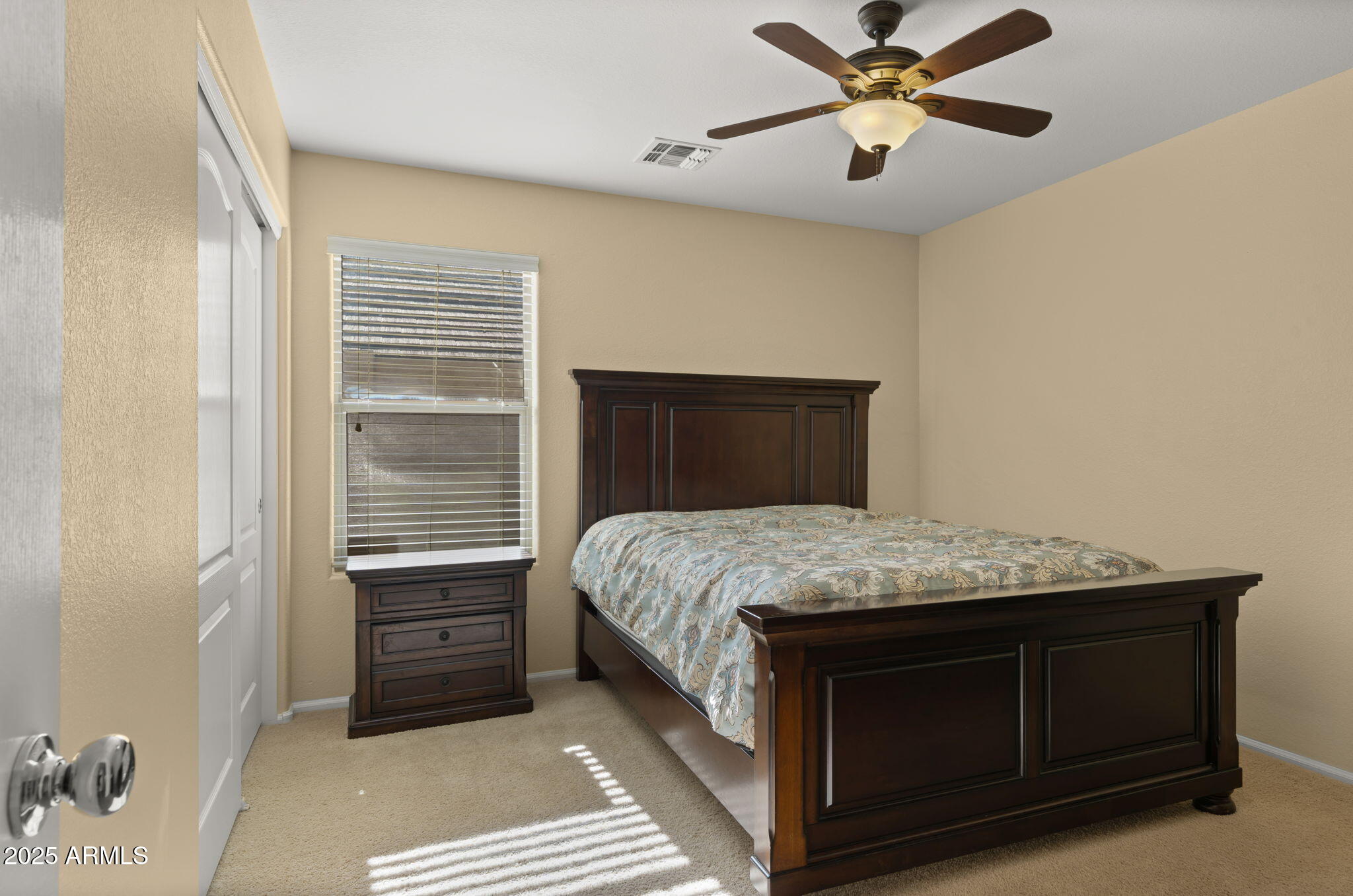 2215 West Peak View Road Phoenix, AZ 85085 - Photo 26 of 51 a bedroom with a bed and a window