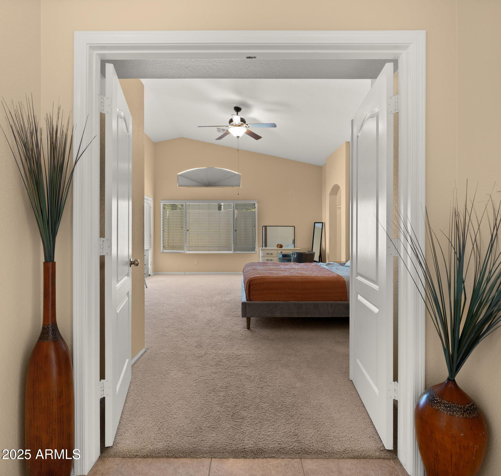 2215 West Peak View Road Phoenix, AZ 85085 - Photo 28 of 51 a bedroom with a bed and a chandelier