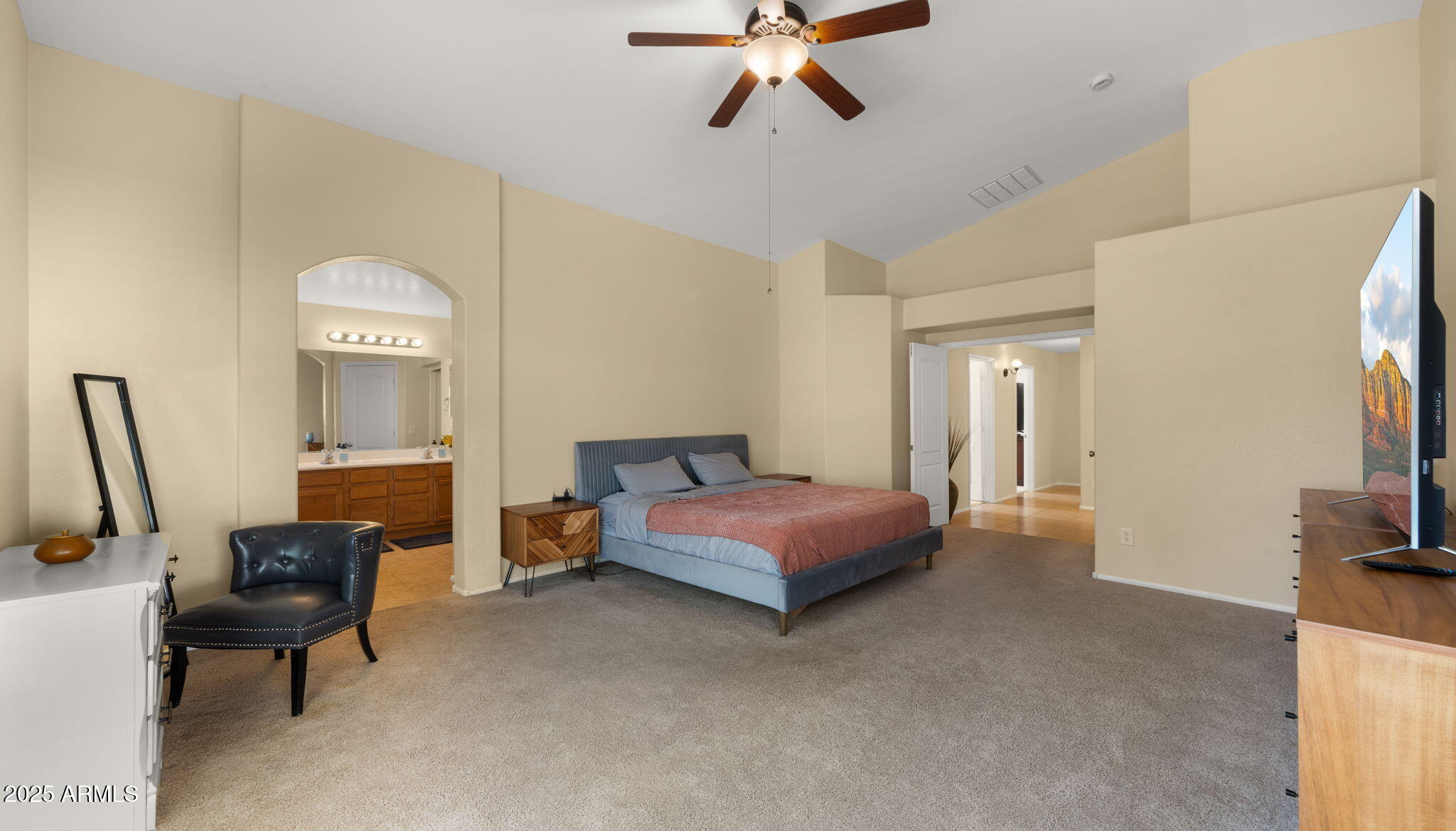 2215 West Peak View Road Phoenix, AZ 85085 - Photo 31 of 51 a living room with furniture and a flat screen tv
