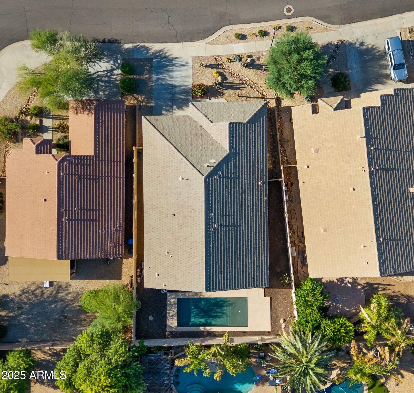 2215 West Peak View Road Phoenix, AZ 85085 - Photo 42 of 51 a view of a house with a wooden fence