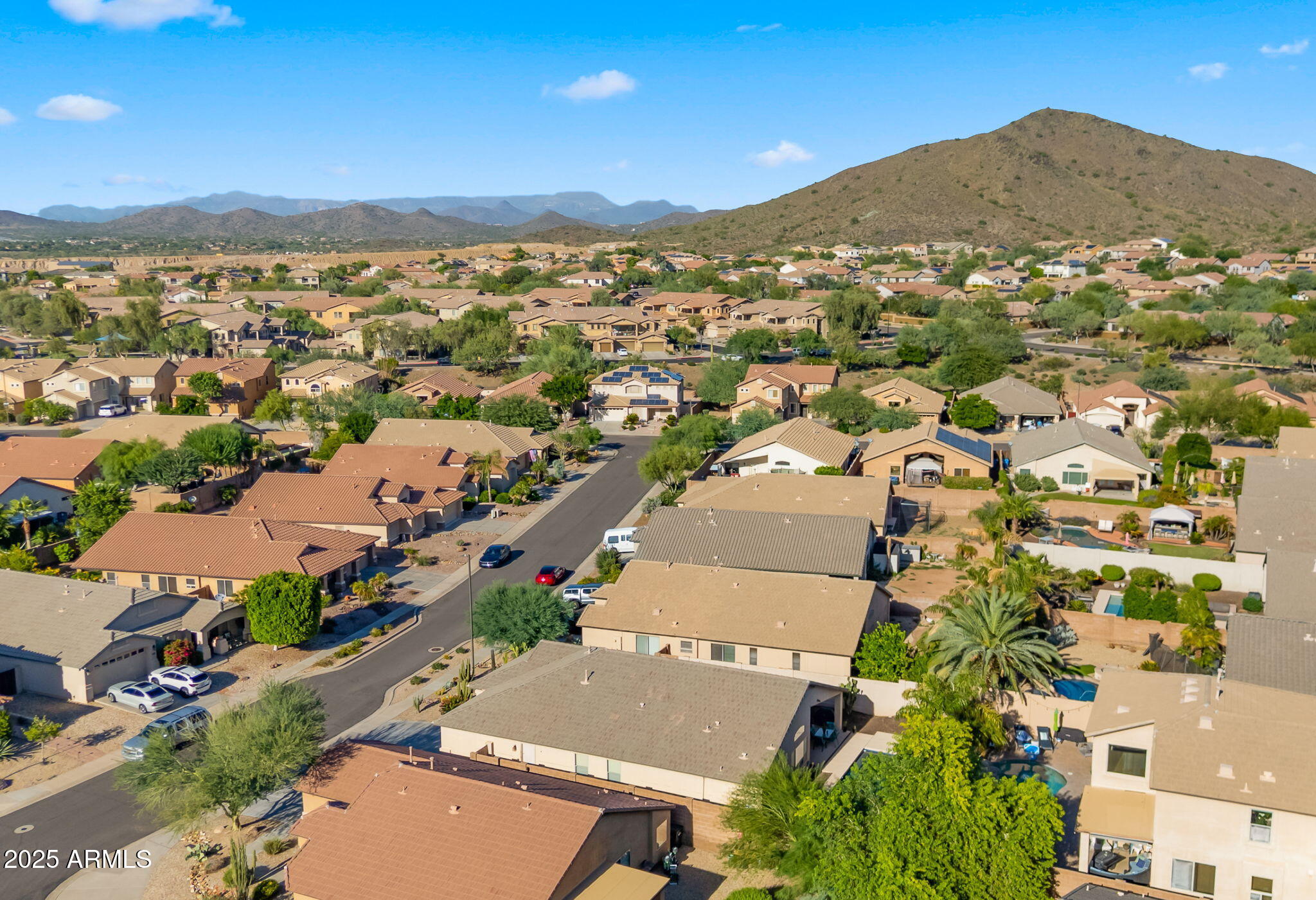 2215 West Peak View Road Phoenix, AZ 85085 - Photo 45 of 51 an aerial view of residential houses with outdoor space