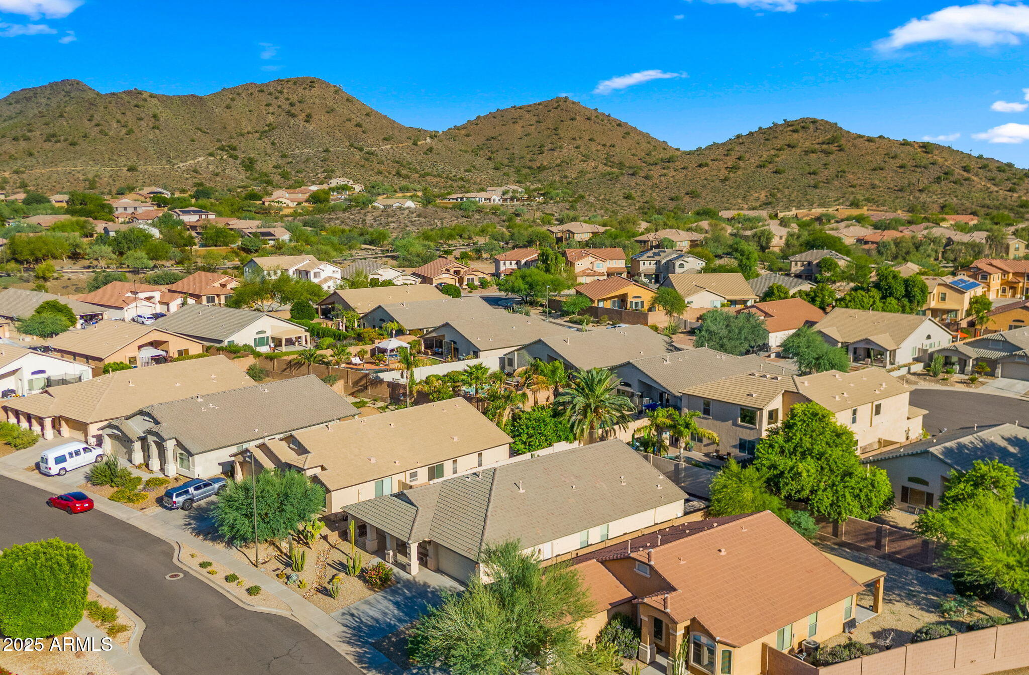 2215 West Peak View Road Phoenix, AZ 85085 - Photo 47 of 51 an aerial view of residential houses and street