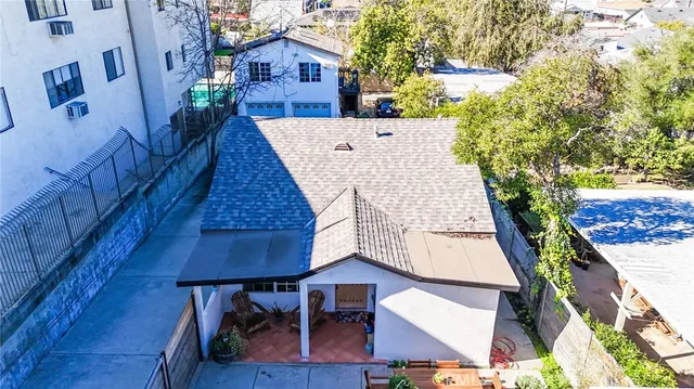 a view of a workspace with furniture and toys