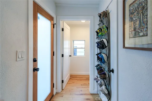 a view of a yard with wooden fence