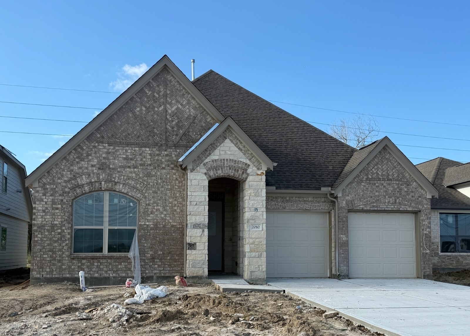 2010 Indigo Rdg Drive Crosby, TX 77532 - Photo 2 of 8 a front view of a house with garden