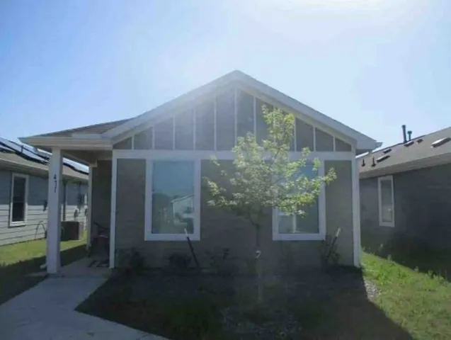a backyard of a house with lots of green space